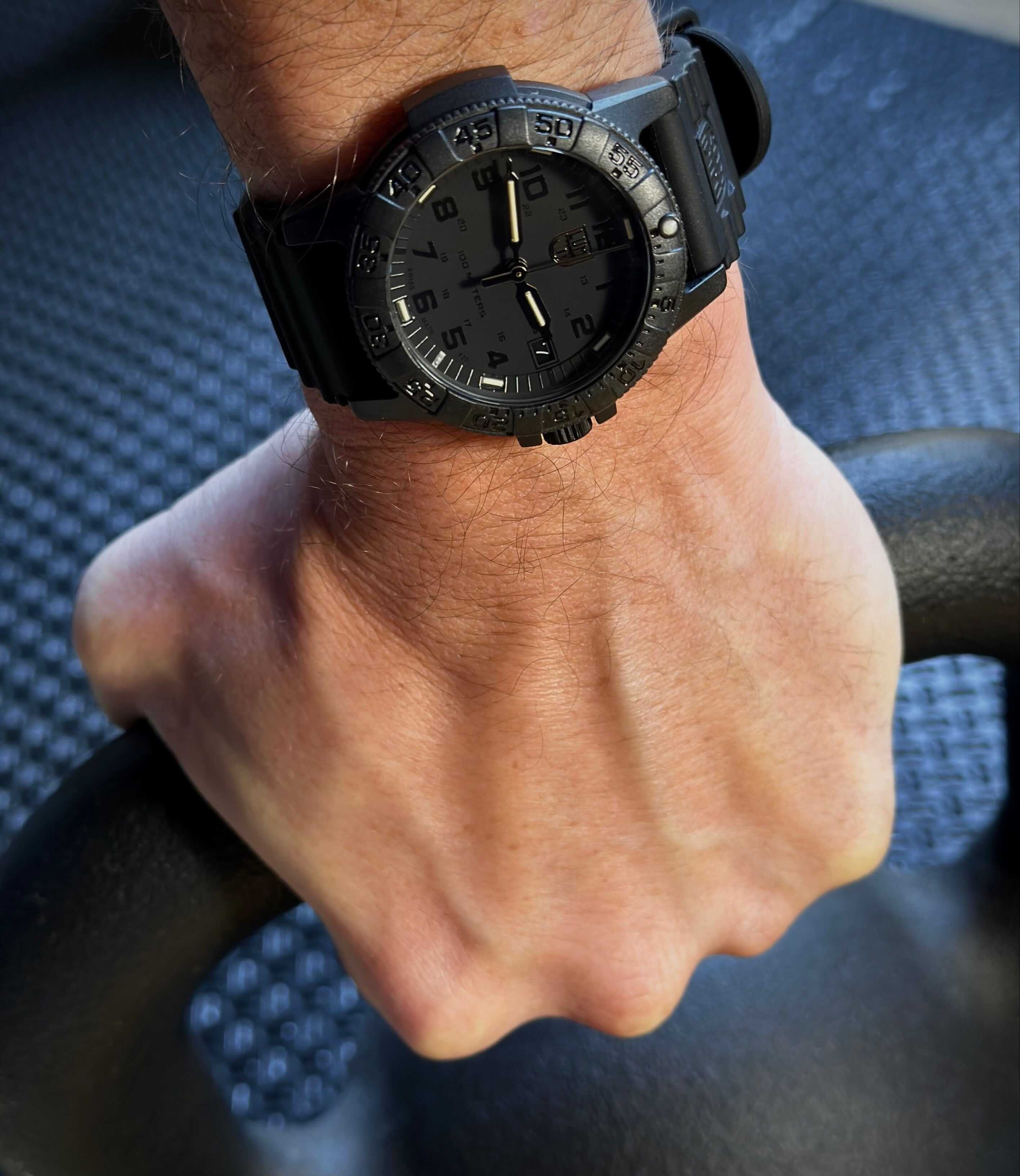 Luminox Leatherback Sea Turtle watch on wrist, showcasing black design and rugged durability.