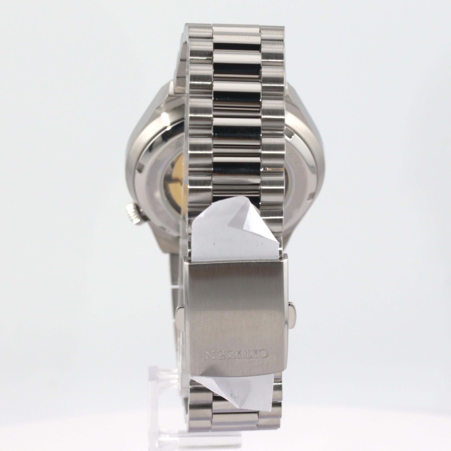 Citizen Tsuyosa automatic watch showcasing a silver-tone stainless steel case and bracelet design from the back.