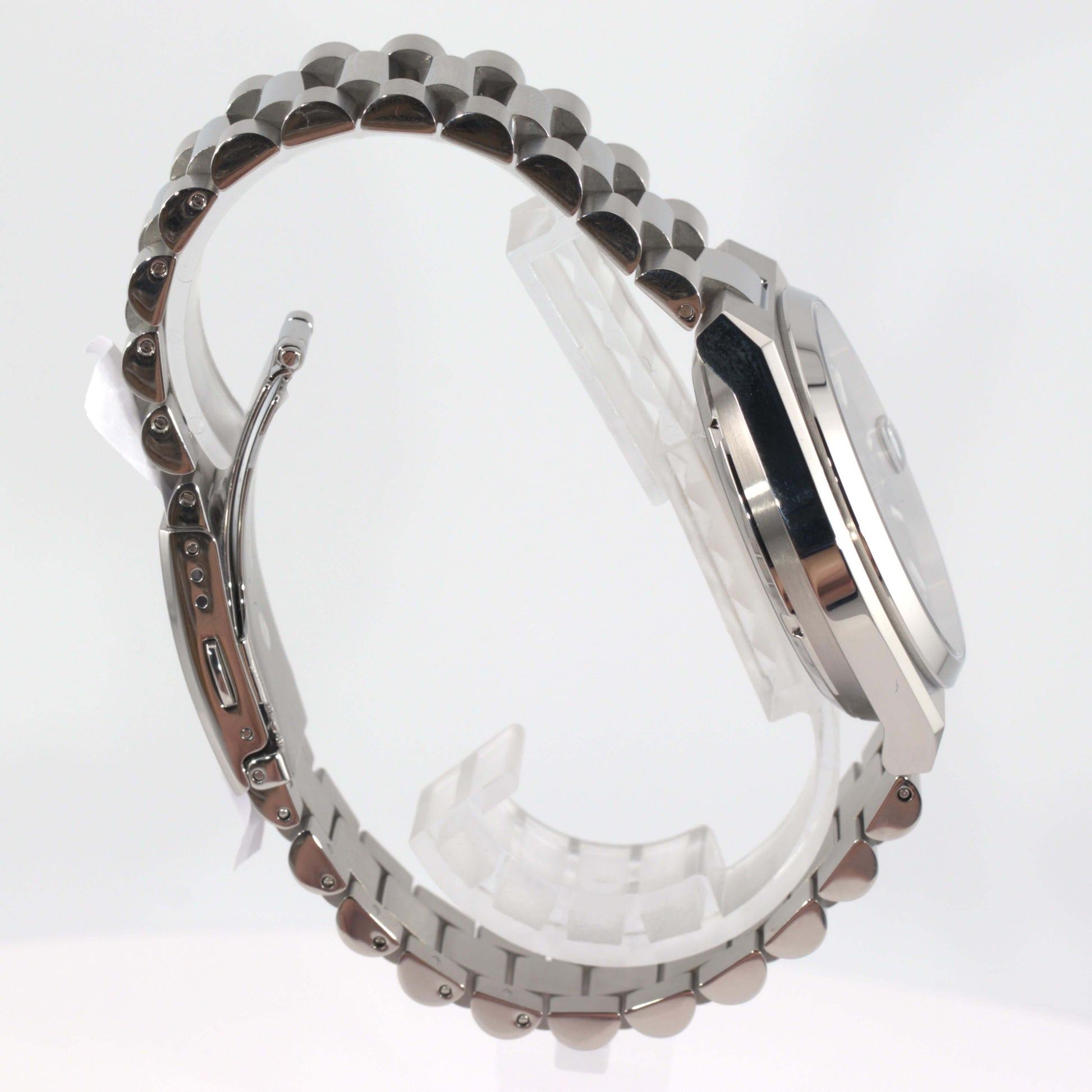 Citizen Tsuyosa automatic watch side view showcasing silver-tone stainless steel case and bracelet design.