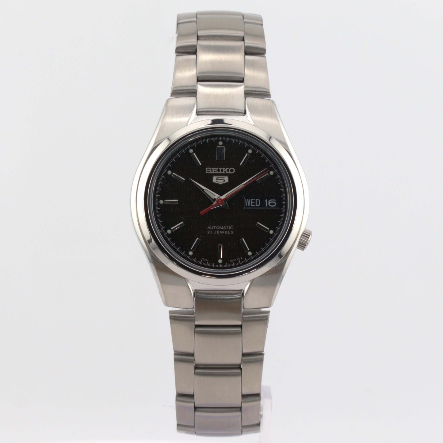Seiko 5 automatic watch SNK607K1 featuring a black dial with luminous hands and a polished stainless steel case.