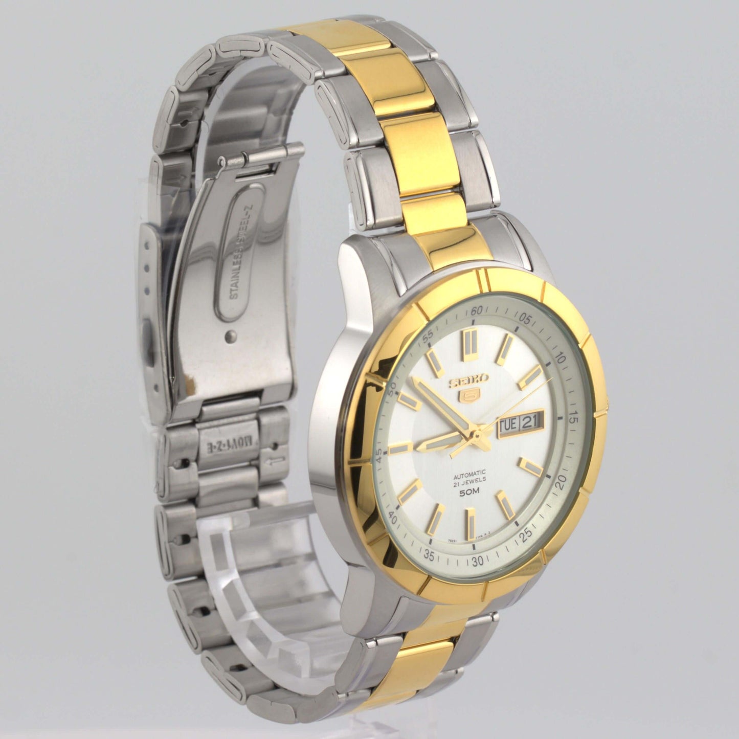 Seiko 5 Silver/White Dial SNKN58K1 automatic watch featuring a two-tone stainless steel bracelet.