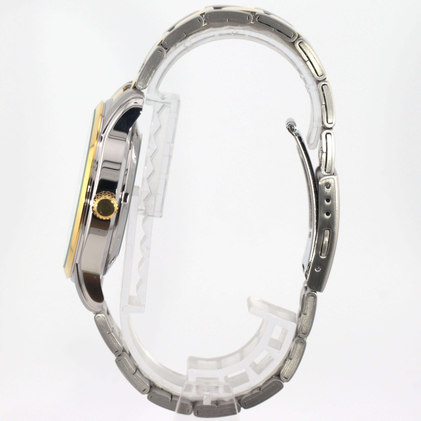 Seiko 5 automatic watch white dial side view showcasing its stainless steel bracelet and case design.