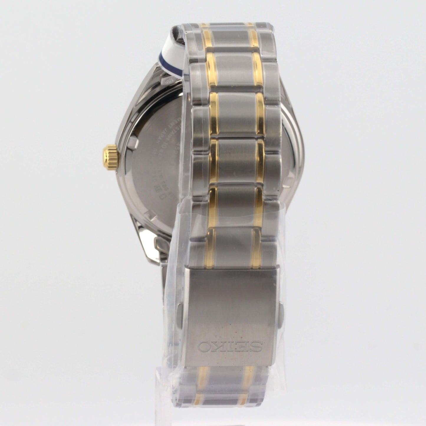 Seiko white dial luxury watch back view showcasing the two-tone bracelet design.