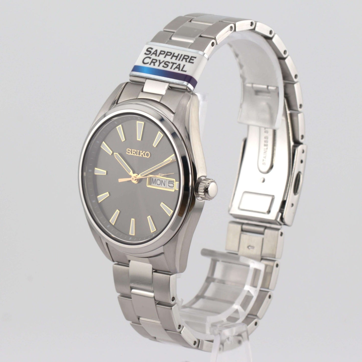 Seiko SUR343P1 luxury watch featuring a charcoal gray dial and a two-tone silver and gold design.