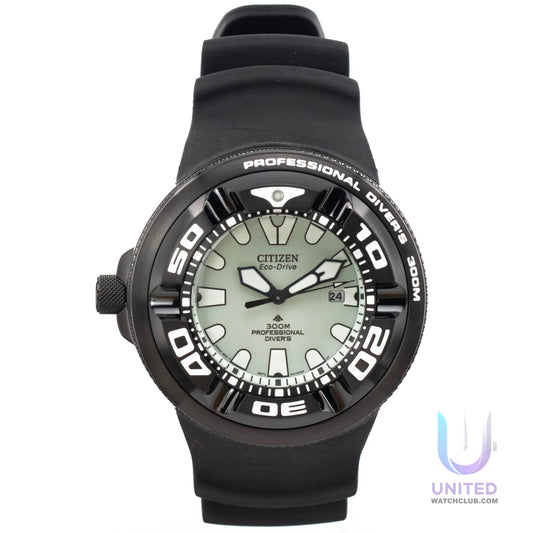 Citizen Promaster Marine Diver Watch with black silicone strap and luminous green dial, 300m water resistant.
