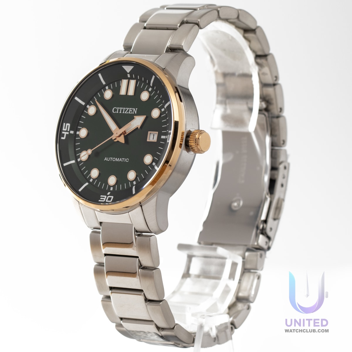 Citizen automatic green dial watch with stainless steel case and gold-tone bezel.