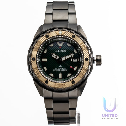 Citizen Promaster Marine green dial watch with a dark green dial and gold bezel, perfect for divers.