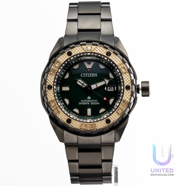 Citizen Promaster Marine green dial watch with a dark green dial and gold bezel, perfect for divers.