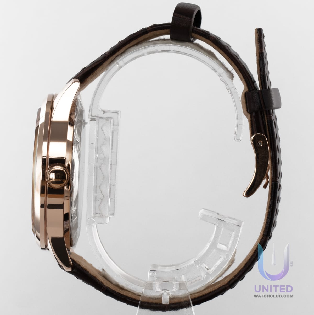 Citizen automatic watch beige dial side view showing elegant design and craftsmanship.