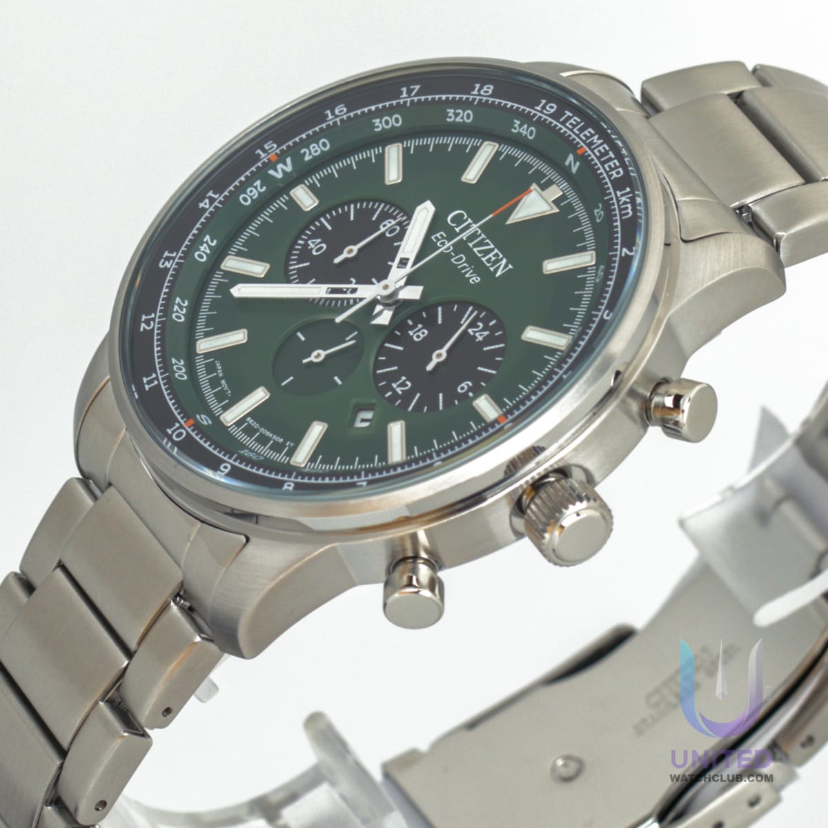 Citizen Eco-Drive chronograph watch with green dial and stainless steel bracelet.