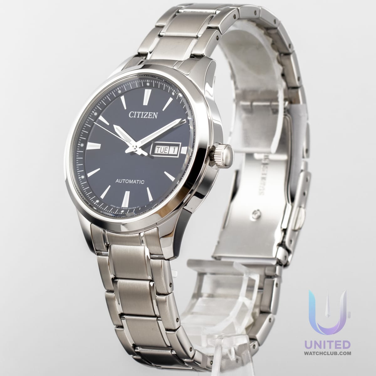 Citizen automatic watch blue dial on stainless steel bracelet showcasing automatic movement and day-date display.