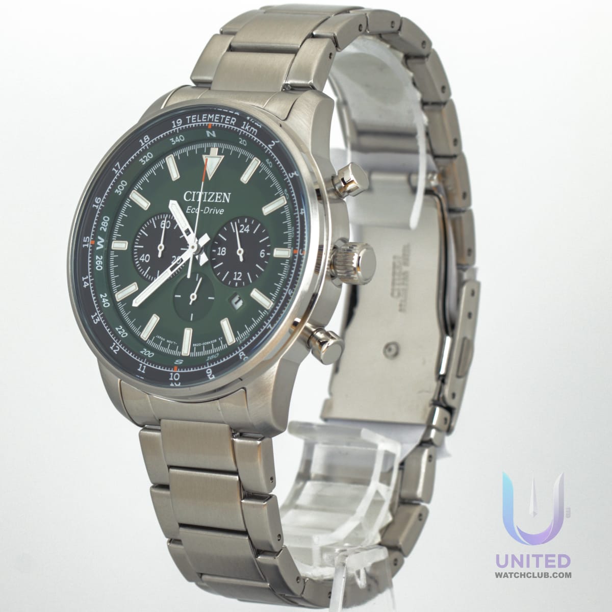 Citizen Eco-Drive chronograph watch with a green dial and stainless steel bracelet.
