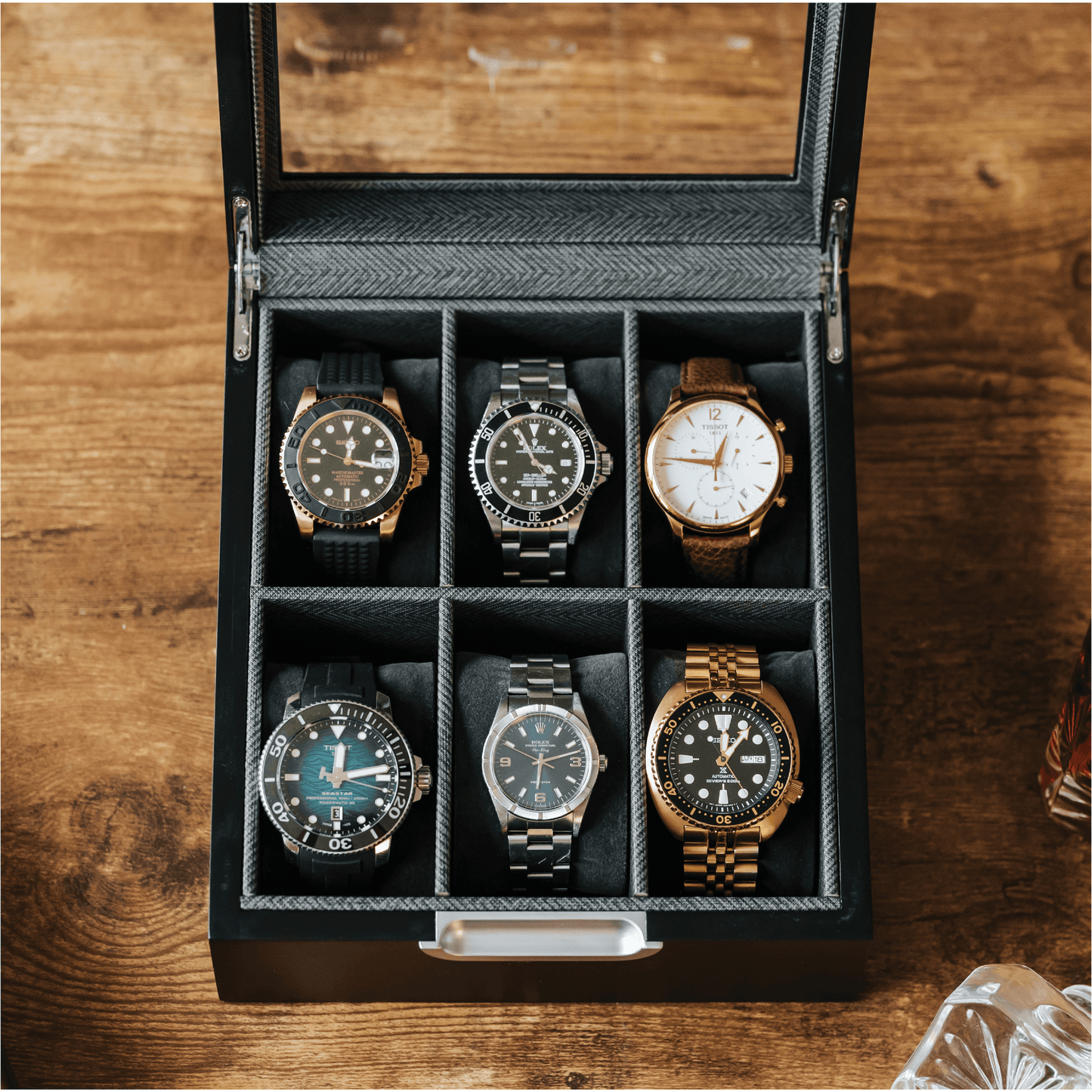 Modern 2x3 watch box displaying six elegant watches in a stylish wooden storage solution.