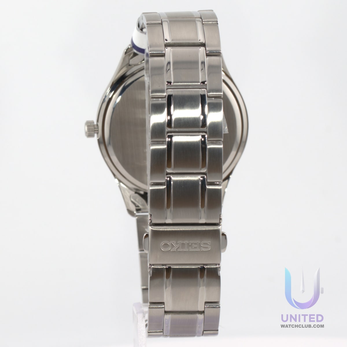 Seiko blue dial watch showing the stainless steel bracelet and case from the side, highlighting its elegant design.