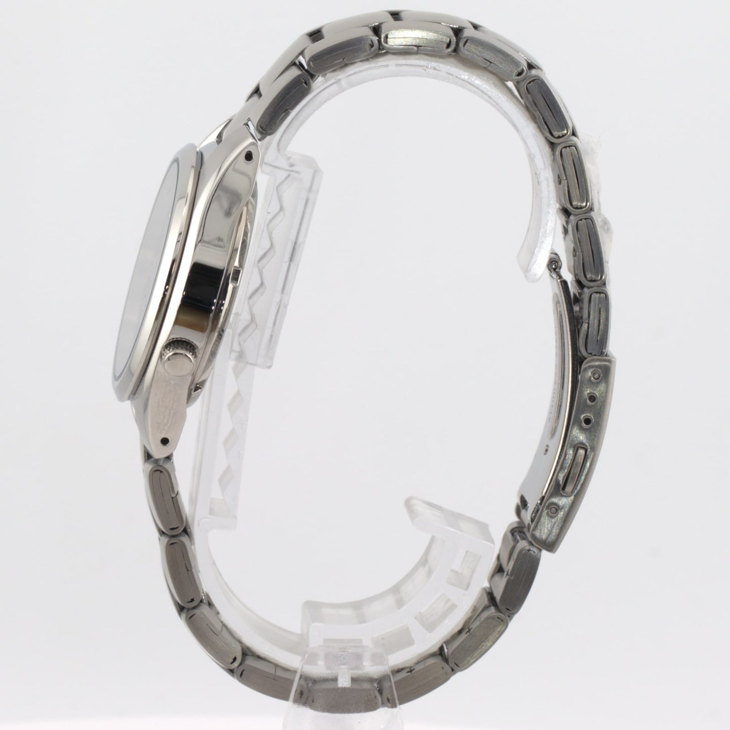 Seiko 5 automatic men's watch side view showing stainless steel bracelet and case design.