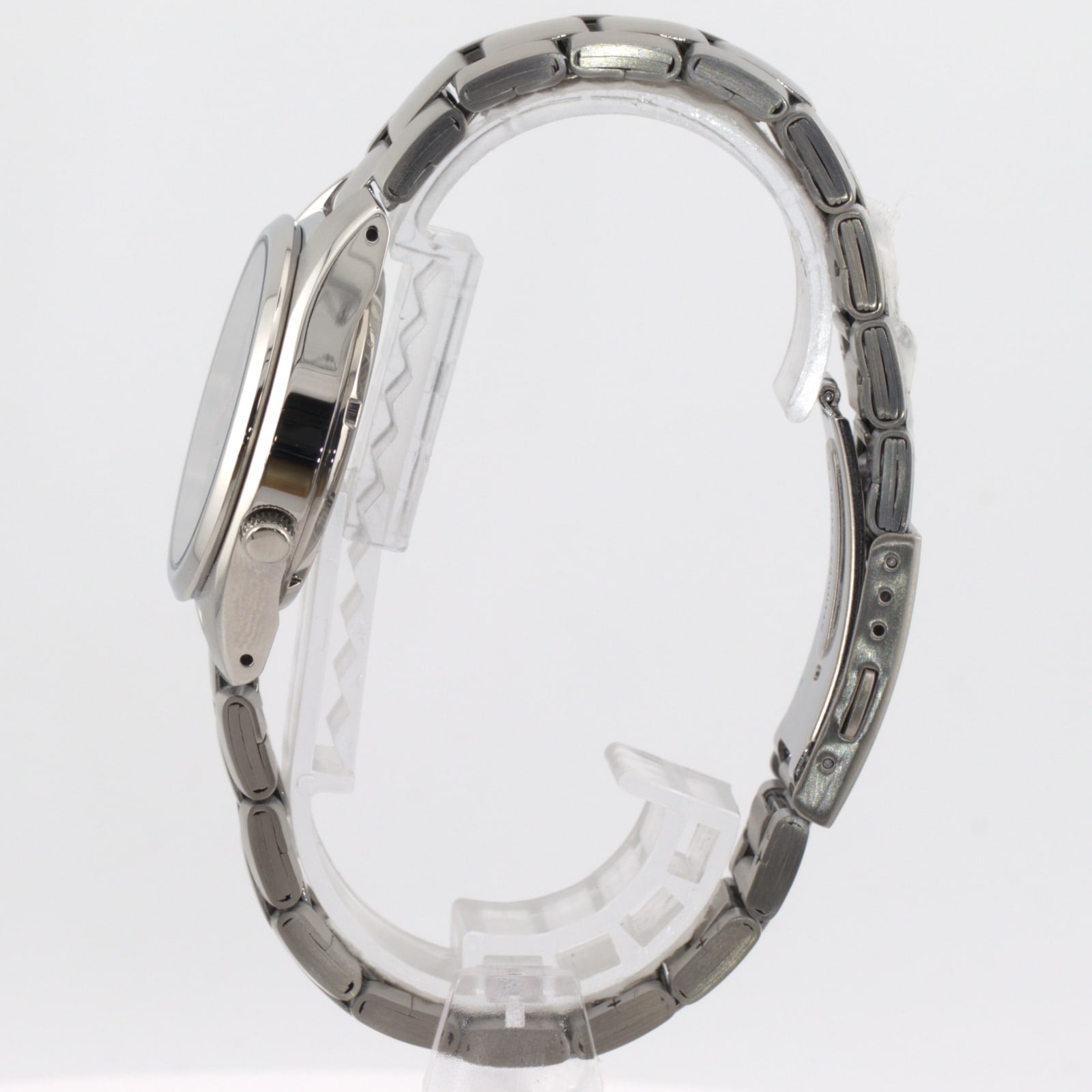 Seiko 5 automatic men's watch side view showing stainless steel bracelet and case design.