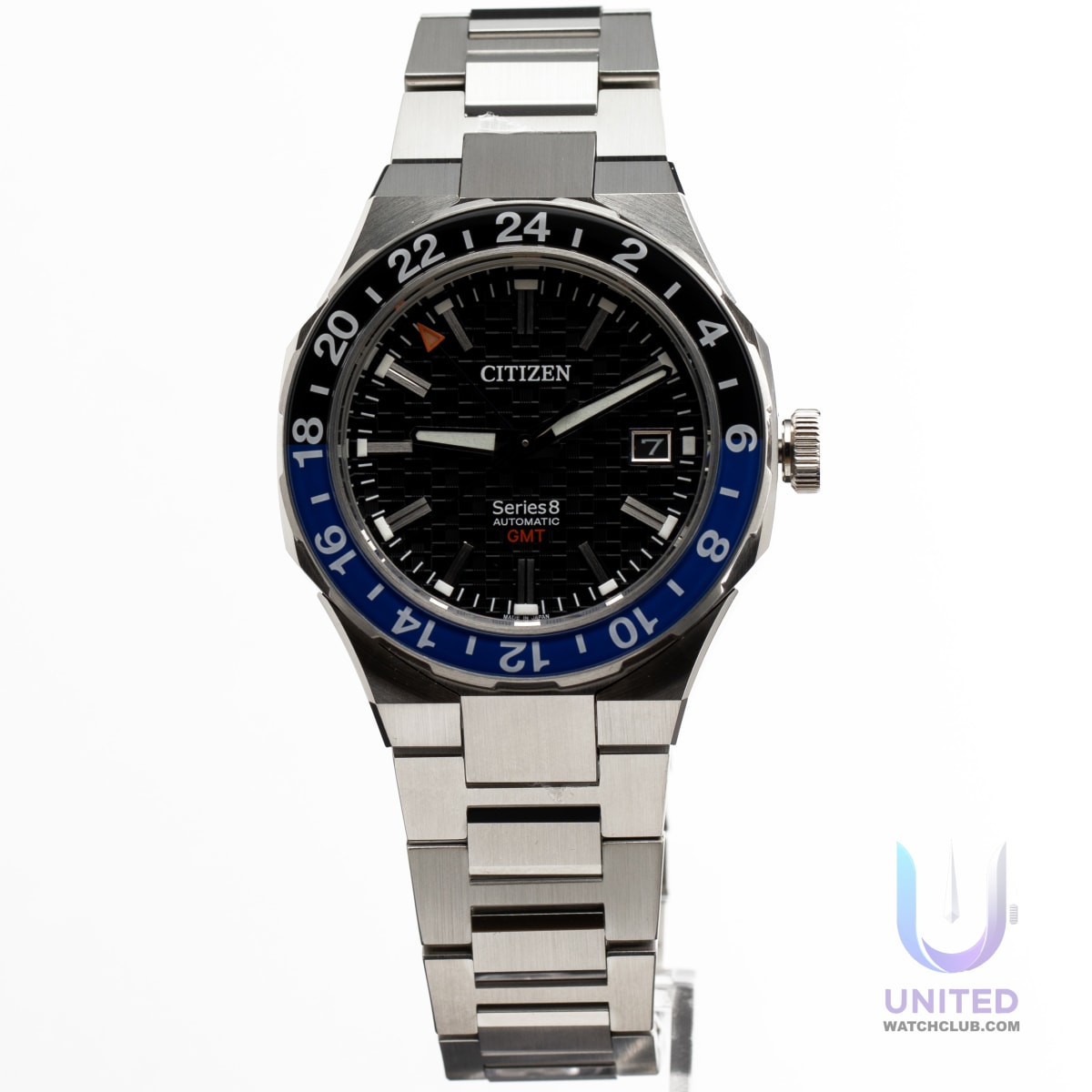 Citizen Series8 880 GMT watch featuring a sleek black dial and bi-directional blue-tone bezel.