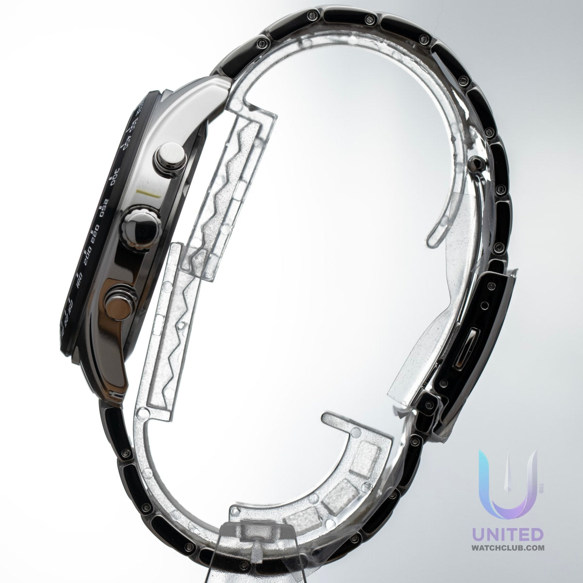 Citizen Eco-Drive green dial chronograph watch side view with stainless steel case and black accents.