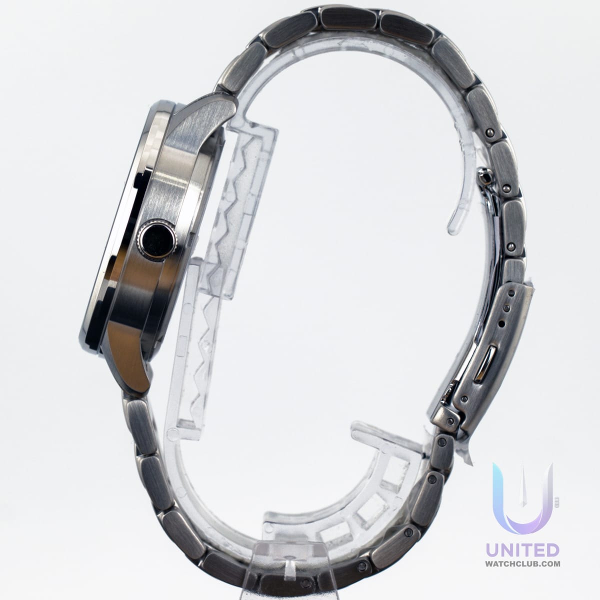 Citizen automatic white dial watch side view showcasing the elegant stainless steel case and band.