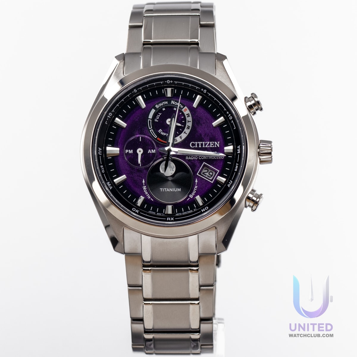 Citizen Tsuki-yomi A-T watch featuring a purple dial and silver-tone titanium case, showcasing style and technology.