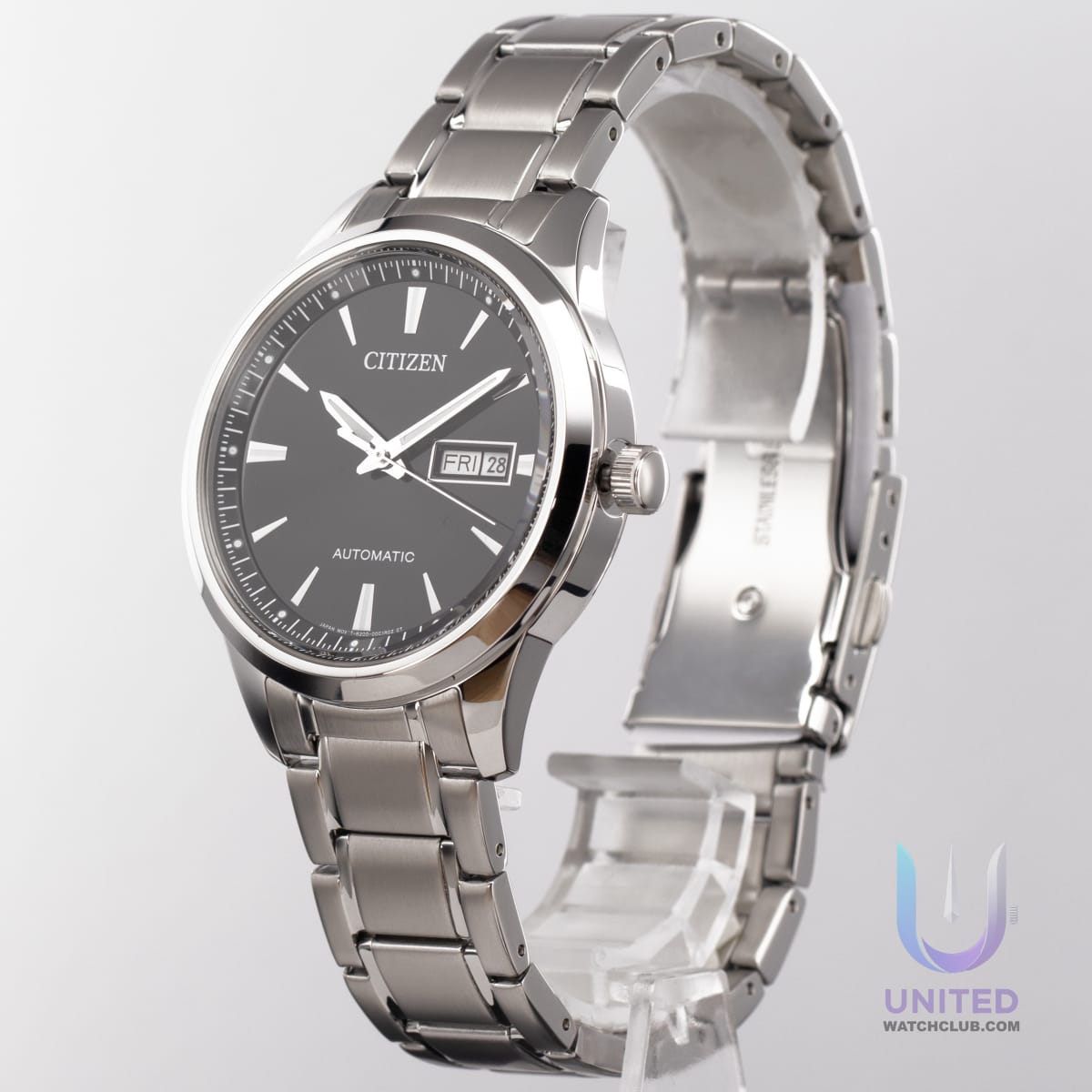 Citizen automatic black dial watch showcasing its sleek design and stainless steel bracelet.