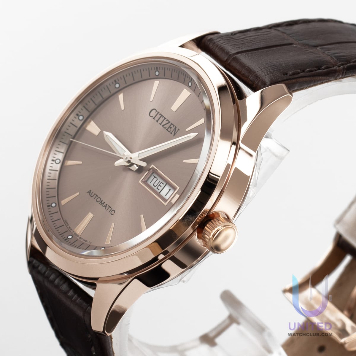 Citizen automatic watch beige dial, elegant timepiece with automatic movement and stylish brown leather strap.