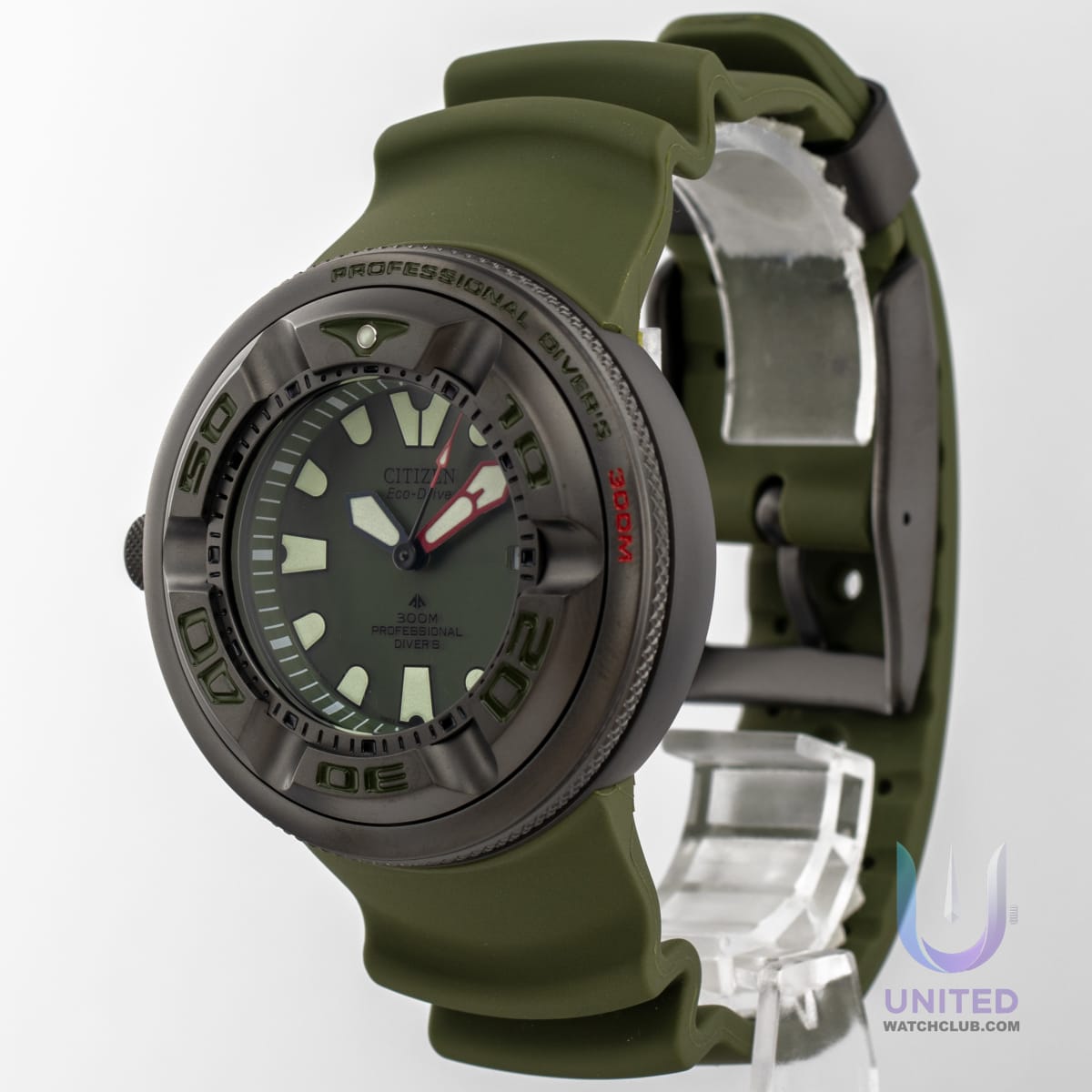 Citizen Promaster Marine green dial diver watch on green rubber strap with stainless steel case and luminous markers.