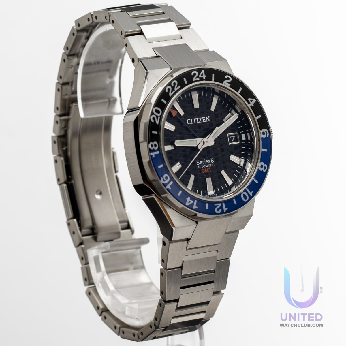 Citizen Series8 880 GMT watch with black dial and bi-directional bezel, silver-tone stainless steel case.